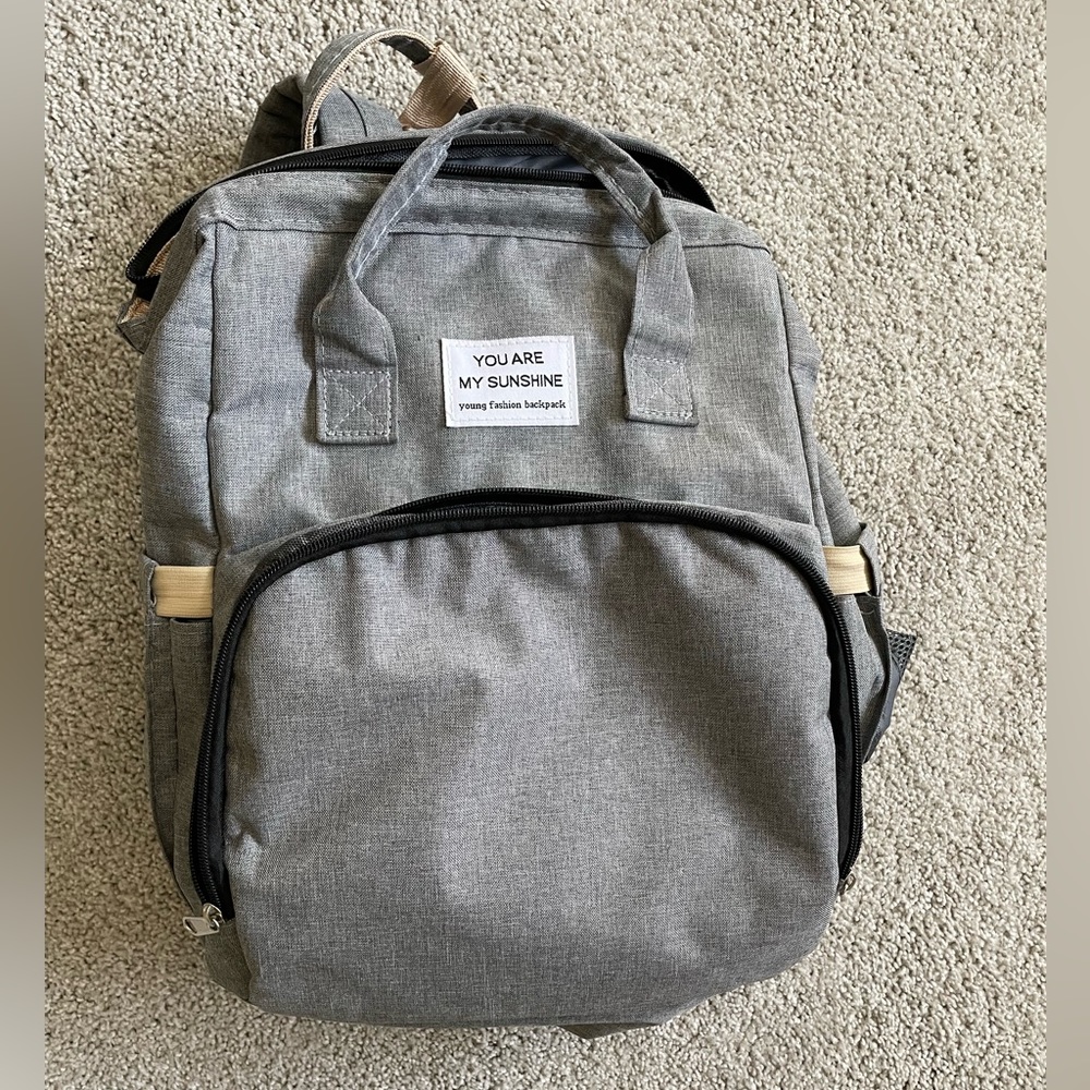 Excellent condition diaper backpack with built-in changing pad